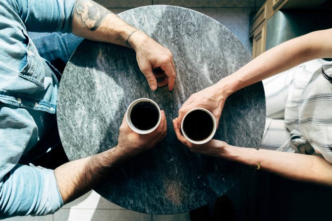 two people having coffee, interview