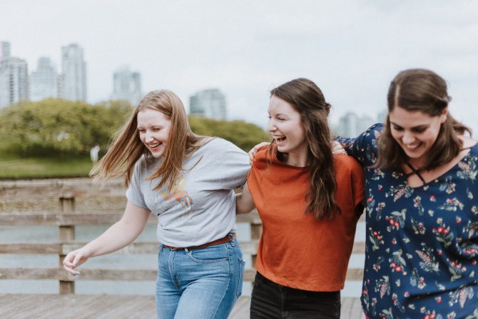 three girls laughing