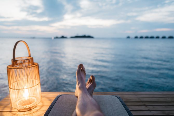 relaxing by lake