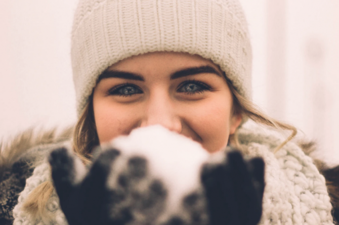 winter break, girl holding snowball
